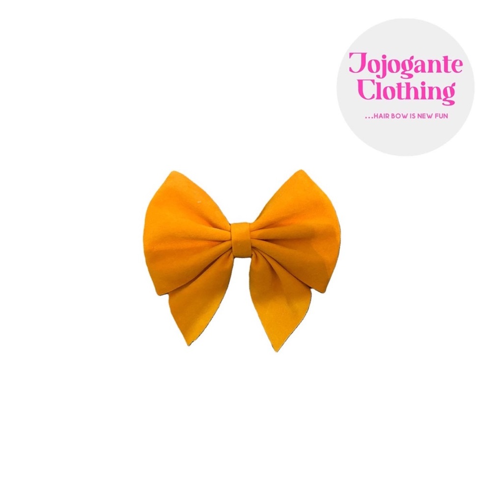 A hair bow “Jojogante Velvet Sailor bow”